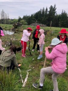 Redwoodtown tamariki planting at the Pine Valley wetlands restoration.