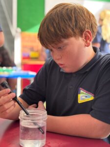 checking the temperature of several water samples