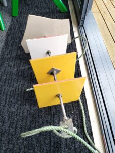 A parent made marine plates for the akonga to hang off the wharf and study one day
