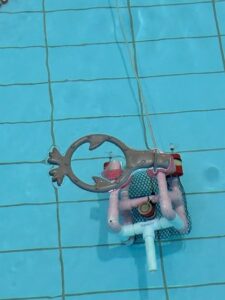 Using the bot to pick up the swim ring