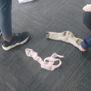 The tamariki wondered where a woolen sock goes on the waste timeline